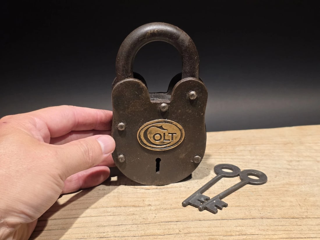 5" Cast Iron Colt Firearms Ammo Box Padlock Lock: Title: 5" Antique Vintage Style Cast Iron Colt Firearms Ammo Box Padlock LockDescription: 3" Wide x 5" Tall Nice reproduction brass Colt padlock! This lock is fully functional! Hard to tell its age.