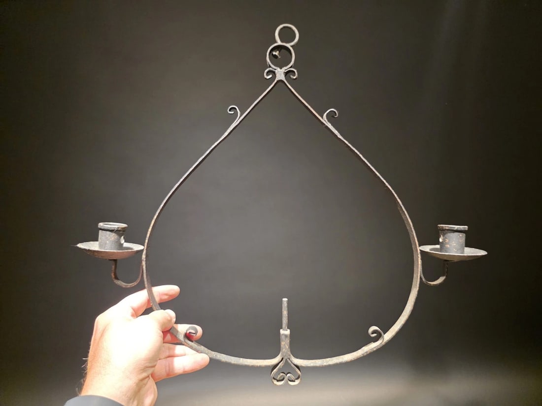 16 1/2" Hand Forged Iron Moravian Hanging Pricket Candle Holder: Title: 16 1/2" Hand Forged Iron Moravian Hanging Pricket Candle Holder Description: 16 1/2" Tall x 17 1/2" Wide Late 20th C Reproduction Wrought Iron Hanging Candle Chandelier This reproduction wrough
