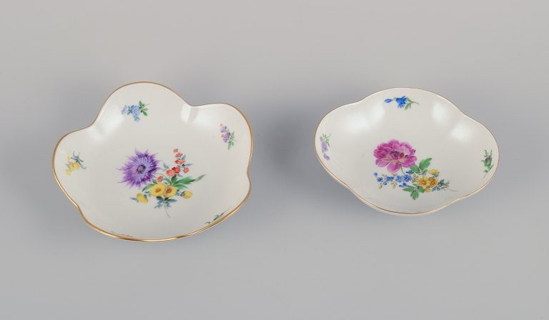 Meissen, Germany. Two porcelain bowls hand-painted with polychrome flowers. Gold rim. (1 of 8)