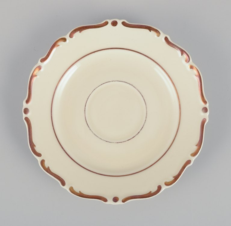 A set of six KP, Karlskrona tea cups with saucers in cream-colored porcelain with gold decoration. - 7