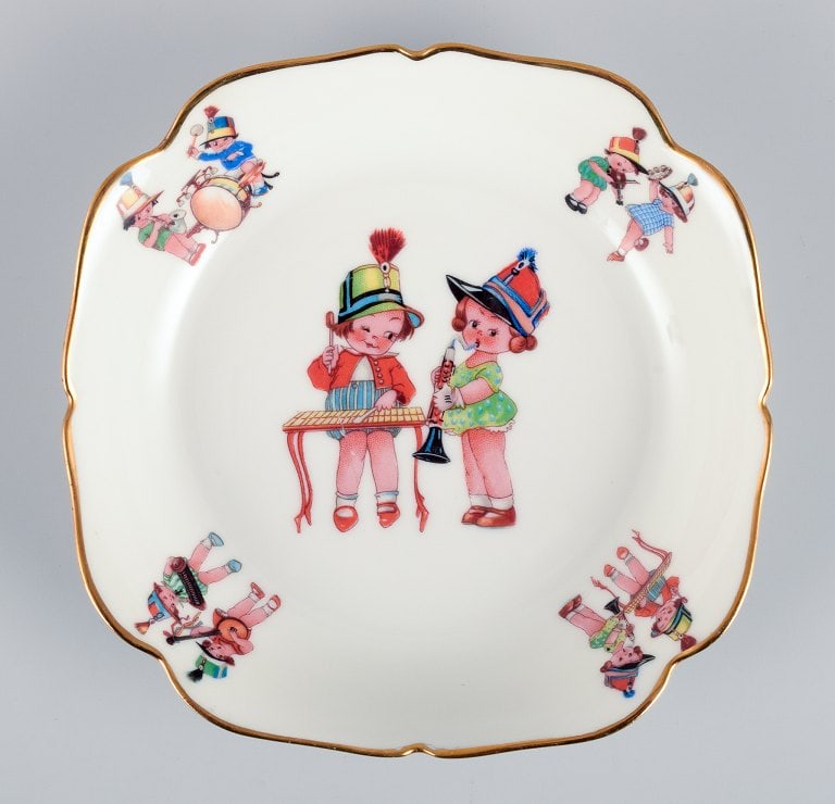 Limoges, France. Two deep childrens plates in porcelain. Gold rim. Motifs of child musicians. - 7