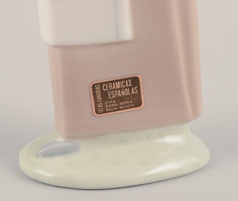 Lladro, Spain. Porcelain figurine of a standing young woman holding a lamb in her arms. - 7