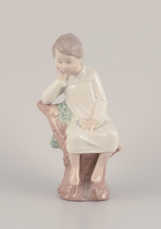 Lladro, Spain. Porcelain figurine of a girl sitting on a tree stump. - 2