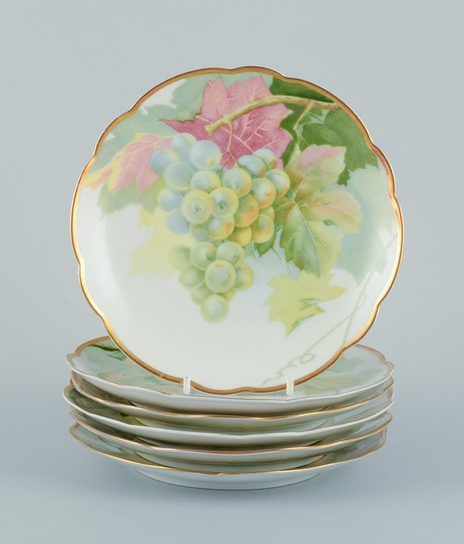 Rosenthal, Germany. A set of six porcelain plates with various fruit motifs. Gold rim. (1 of 8)