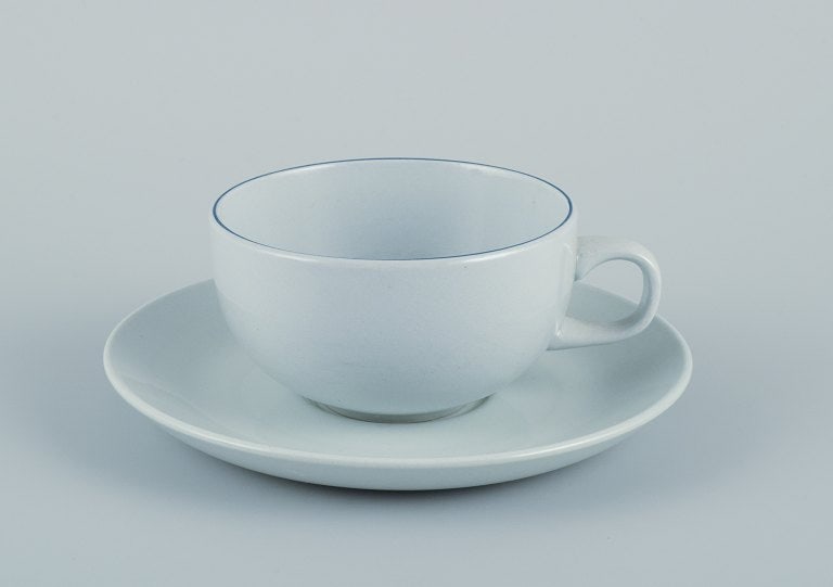 Grethe Meyer for Aluminia. A set of four Blue line coffee cups with saucers in faience. - 2