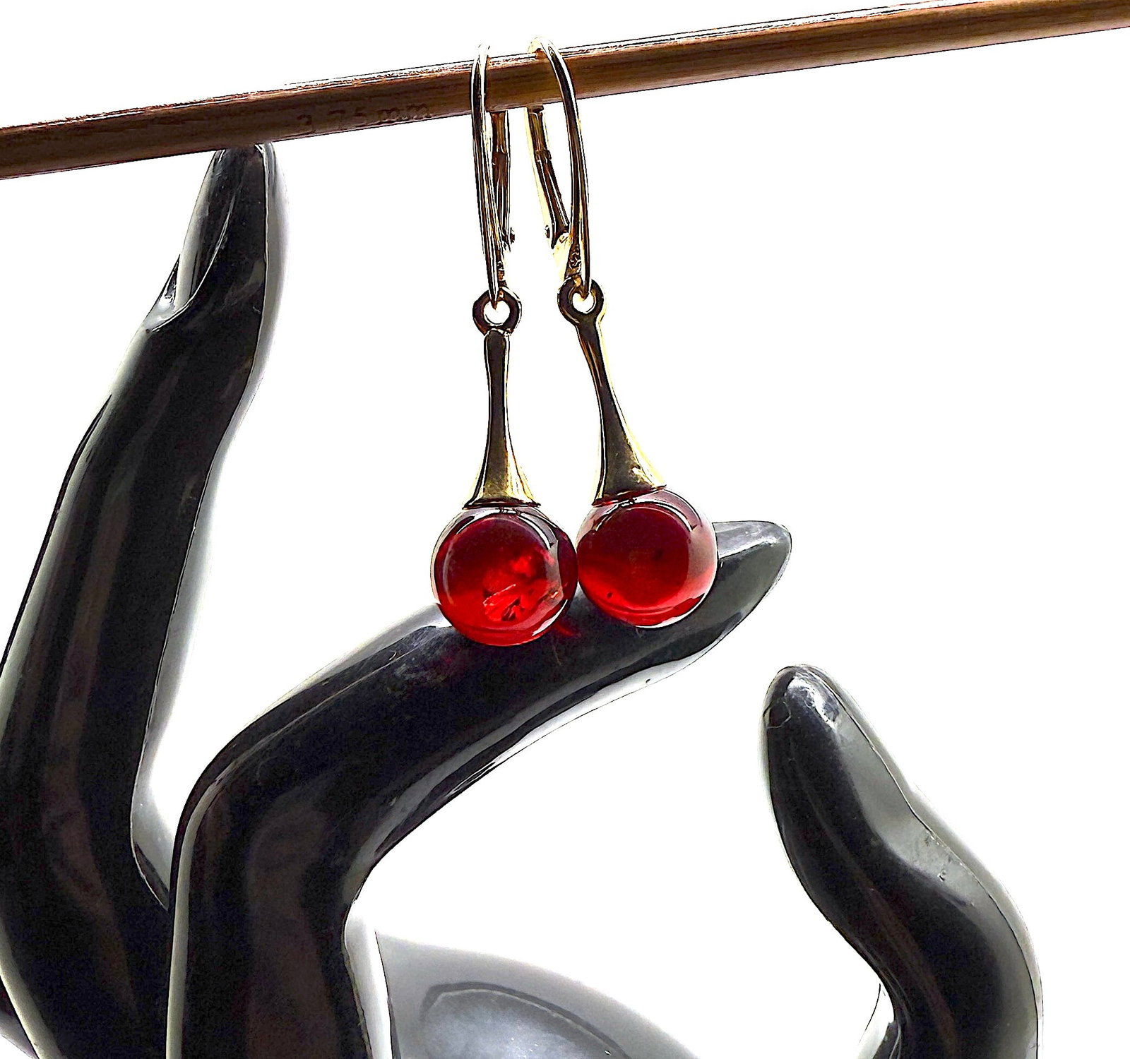 Fascinating Amber Earrings: Title:Fascinating Amber Earrings Metal:925 Silver-Gold Plated Gemstone:Amber Weight:3.7 g Size:Size: 10.0 x 10.0 x 40.0 mm Size: 0.394 x 0.394 x 1.575 inches Made of:(Reconstituted Amber or Whole Ston