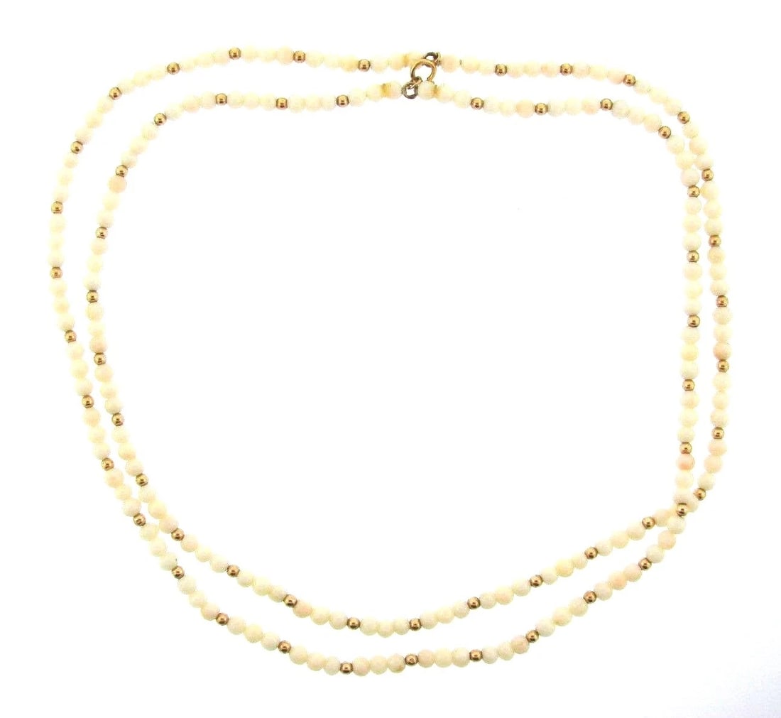 WOW 14k Yellow Gold & Angel Skin Coral Necklace: Title: WOW 14k Yellow Gold & Angel Skin Coral Necklace Description: DK 14k Yellow Gold & Angel Skin Coral Strand Necklace · Wonderful necklace that is a necessity in your collection. 