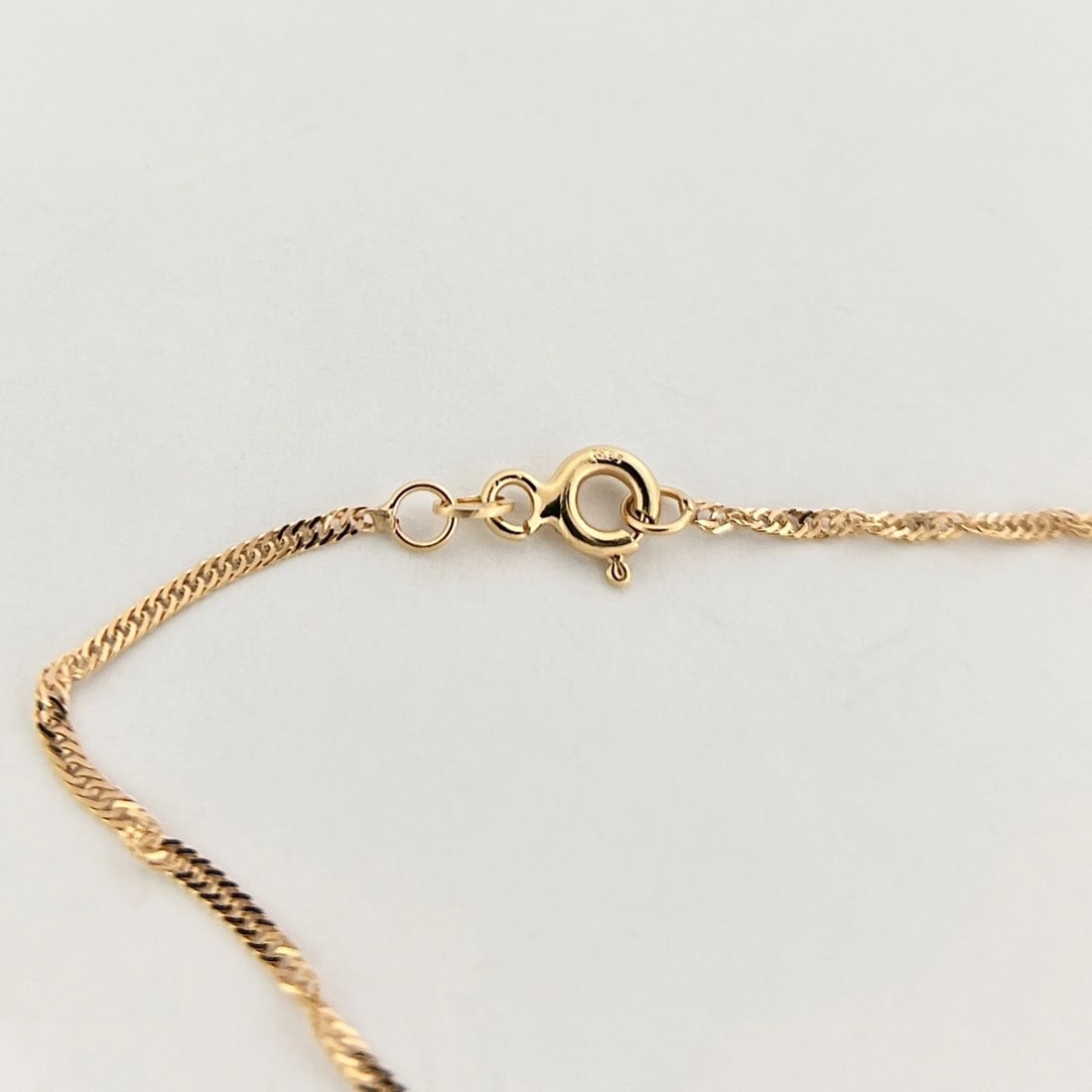 Thin Twisted Singapore Chain Bracelet 14K Yellow Gold, 7.5 Inches, .78 Grams - 8