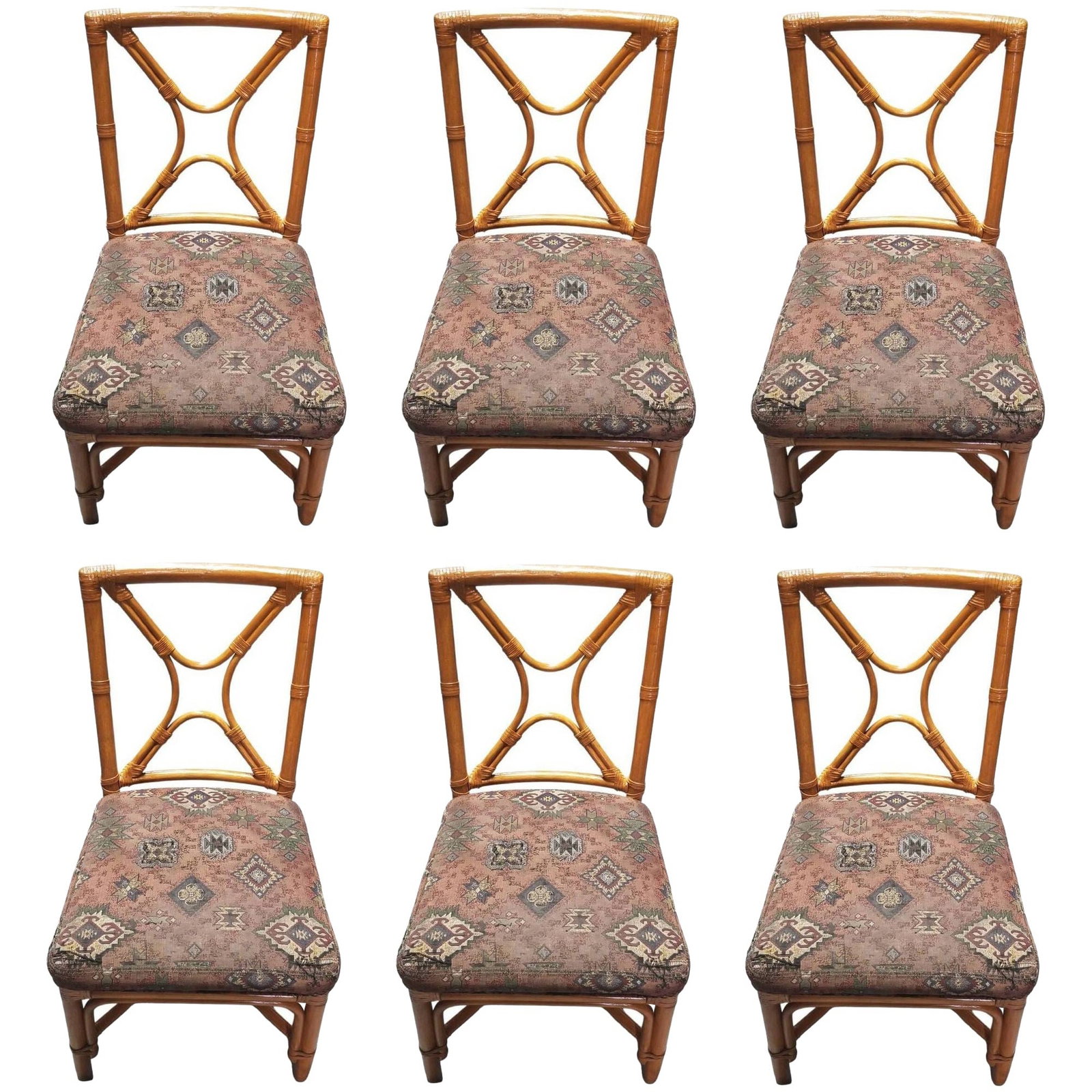 Restored Rattan set of 6 Dining Chairs Featuring X-back and Leather Wrappings.: Title: Restored Rattan set of 6 Dining Chairs Featuring X-back and Leather Wrappings. Description: Restored rattan set of 6 dining chairs featuring a unique X-back and leather wrappings. Dimensions: