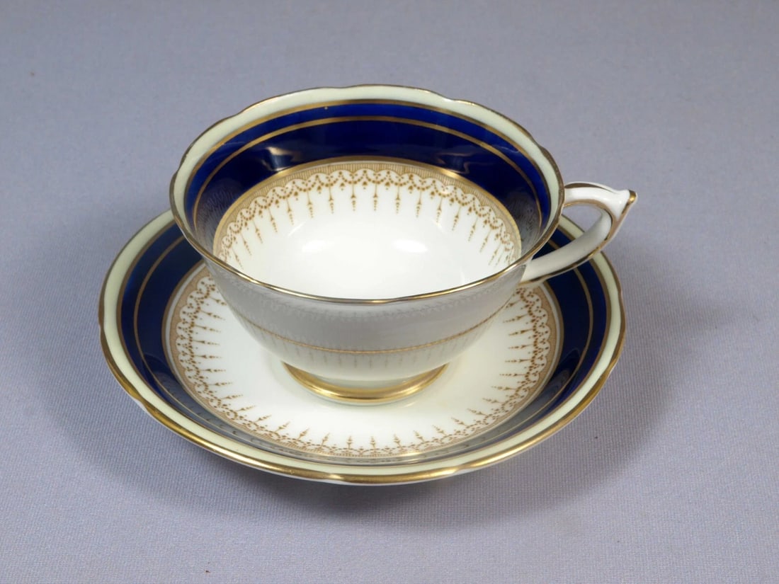 Paragon ATHENE Cobalt Blue Coffee Tea Cup England Made for Simpsons Toronto: Title: Paragon ATHENE Cobalt Blue Coffee Tea Cup England Made for Simpsons Toronto Description: . This is one exceptional Coffee/Tea cup and saucer set was made by Paragon, England. The set is in
