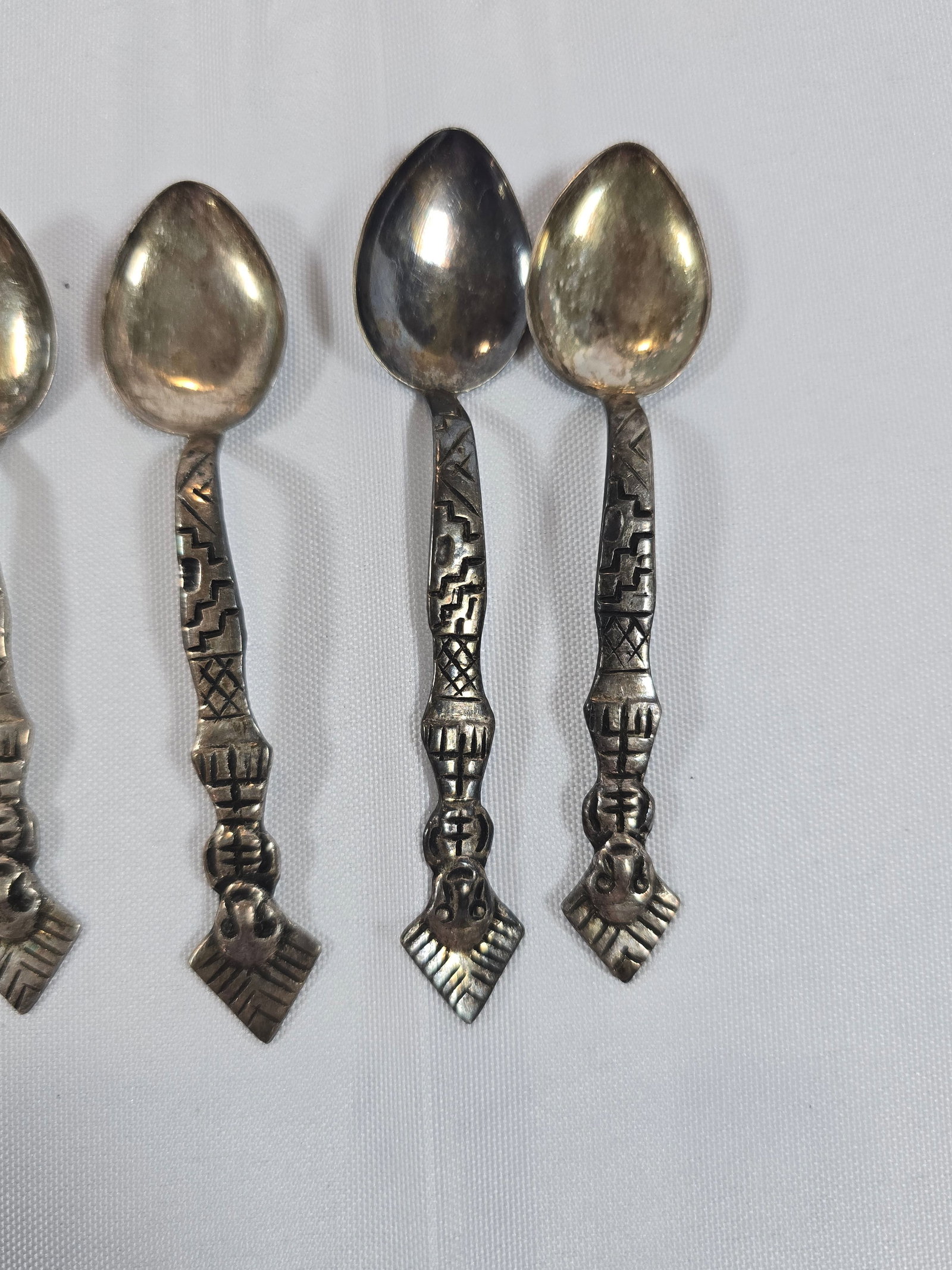 Set of Twelve Vintage Silver-Toned Decorative Spoons - 2