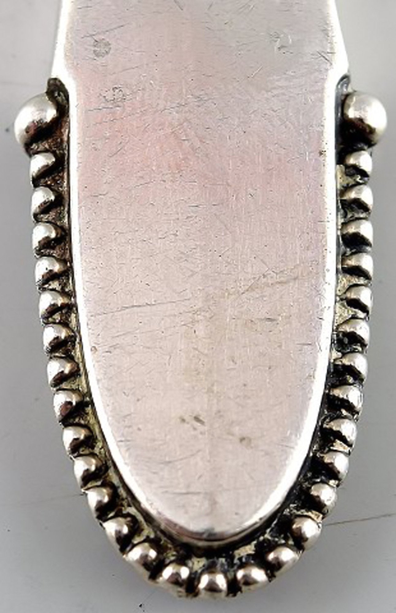 Georg Jensen beaded bottle opener. - 2