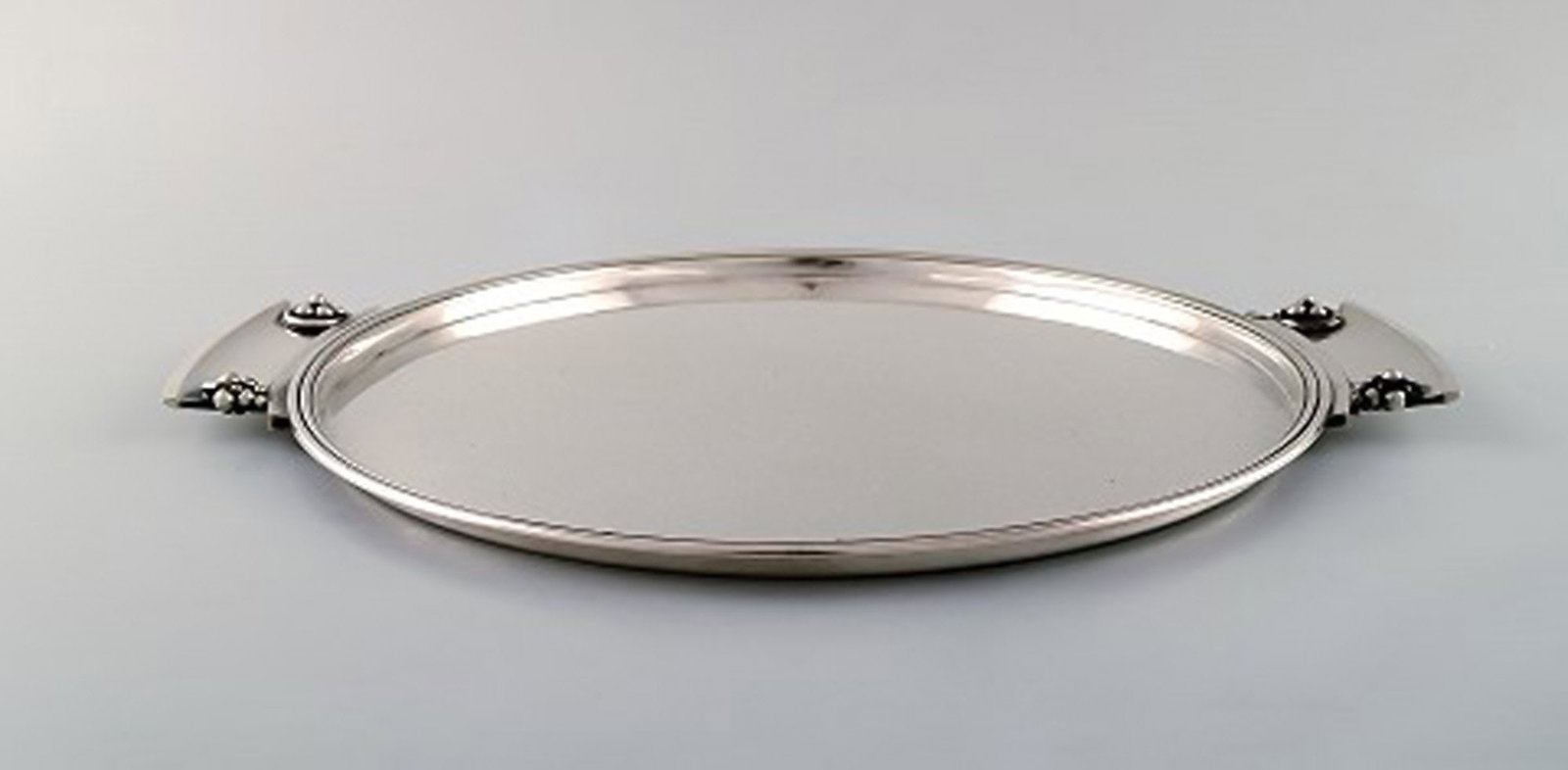Round "Grape" tray with handles in art nouveau style. Model Number 296. - 2