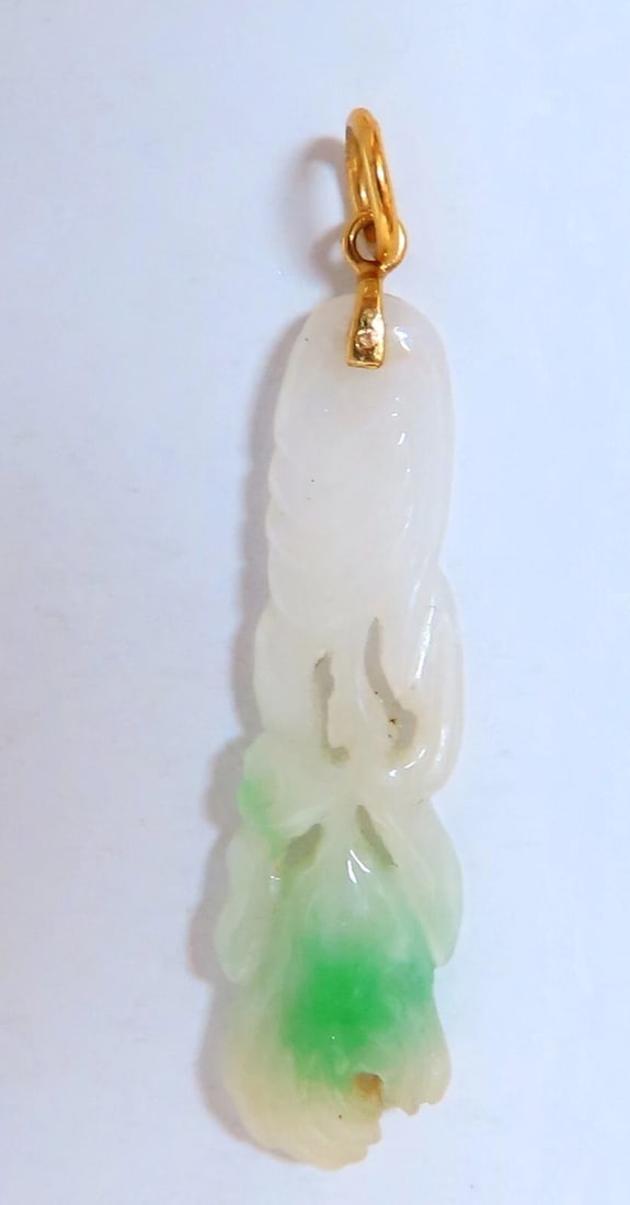 Natural Jade Carved Symbolic Pendant 14kt **: Title: Natural Jade Carved Symbolic Pendant 14kt ** Description: Jade Pendant Apple Green color. 36x 9mm 14kt / 2 grams Reserve: $340.00 Shipping:Domestic: Free shipping to anywhere within the