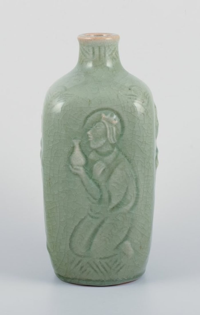Jais Nielsen for Royal Copenhagen. Ceramic vase in celadon glaze with religious motifs. 1940s. - 2