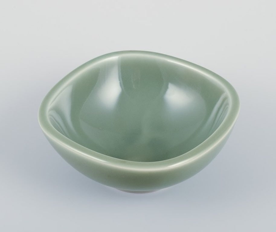 Nils Thorsson for Royal Copenhagen. Ceramic bowl in celadon glaze. Featuring a fish motif. Mid-20th - 3
