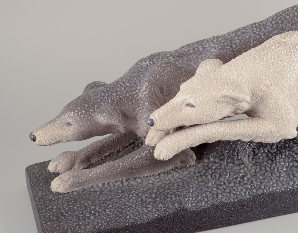 Sevres Vinsare, France. Colossal ceramic sculpture of two running greyhounds. Approx. 1930 - 5