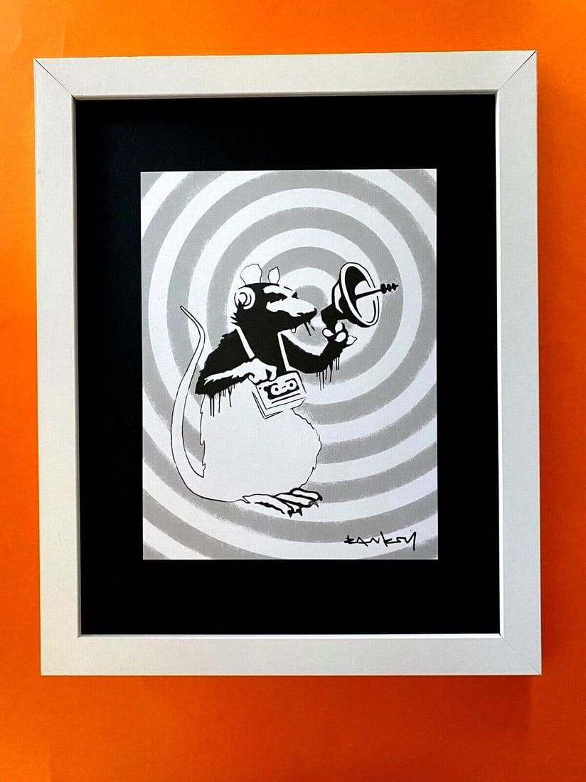 BANKSY + SIGNED GRAFFITI PRINT " THE RAT " + NEW FRAME COLLECTOR ITEM: Title:BANKSY + SIGNED GRAFFITI PRINT " THE RAT " + NEW FRAME COLLECTOR ITEM Description:Beautiful and Scarce Print BANKSY Facsimile Signature in Ink Art Print is about 8 X 8 in. This piece is mounted