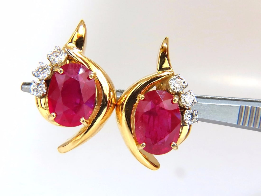 13.00ct Clarity enhanced ruby natural diamond earrings 14kt**: Title: 13.00ct Clarity enhanced ruby natural diamond earrings 14kt** Description: Cluster Ruby Earrings. 12.00ct. Clarity Enhanced Rubies Rubies: Ovals, Full Cut. Semi Transparent & Even Red tone. 12.