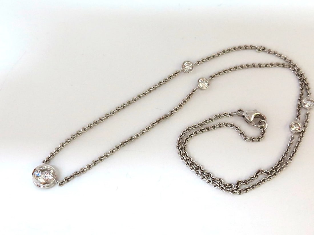 1.50ct NATURAL FLUSH MOUNT (5) DIAMOND BY YARD NECKLACE 18KT G/VS +: Title: 1.50ct NATURAL FLUSH MOUNT (5) DIAMOND BY YARD NECKLACE 18KT G/VS + Description: .90ct center natural flush mount diamond & .60ct. (4) additional diamonds by yard on chain. All Diamonds: Full