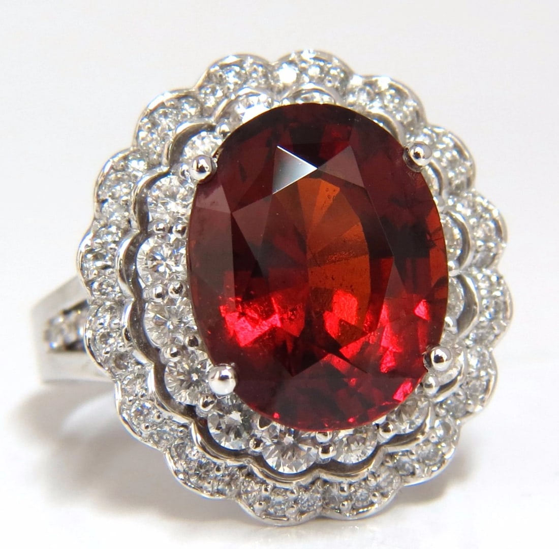 10.90ct Natural Hessonite Garnet Diamonds Ring 14kt Double Halo: Title: 10.90ct Natural Hessonite Garnet Diamonds Ring 14kt Double Halo Description: Hessonite Double Halo 9.45ct. Natural Red Hessonite garnet Ring 14.1 x 11.2mm Full cut oval brilliant Clean Clarity