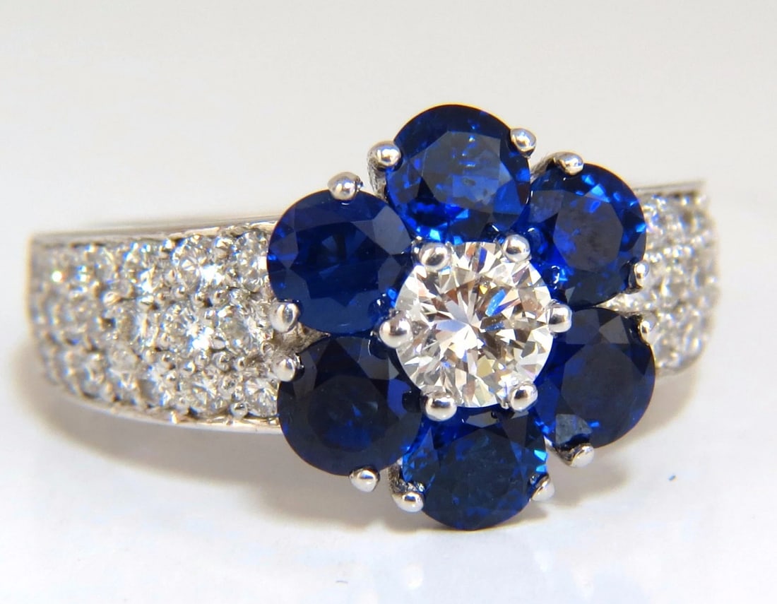 3.66ct natural sapphires diamond cluster ring 14kt royal blue floretta: Title: 3.66ct natural sapphires diamond cluster ring 14kt royal blue floretta Description: Classic Diamond & Sapphires Cluster ring / Floretta .40ct. Natural Round Cut diamond (center) Full Cut Brilli