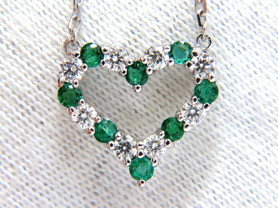 Natural Emeralds & Diamonds open heart necklace .90ct. 14kt G/Vs **: Title: Natural Emeralds & Diamonds open heart necklace .90ct. 14kt G/Vs ** Description: Loves & Sparkles. .40ct. Natural diamonds & .50ct natural emeralds heart necklace. Rounds, hand selected from fi