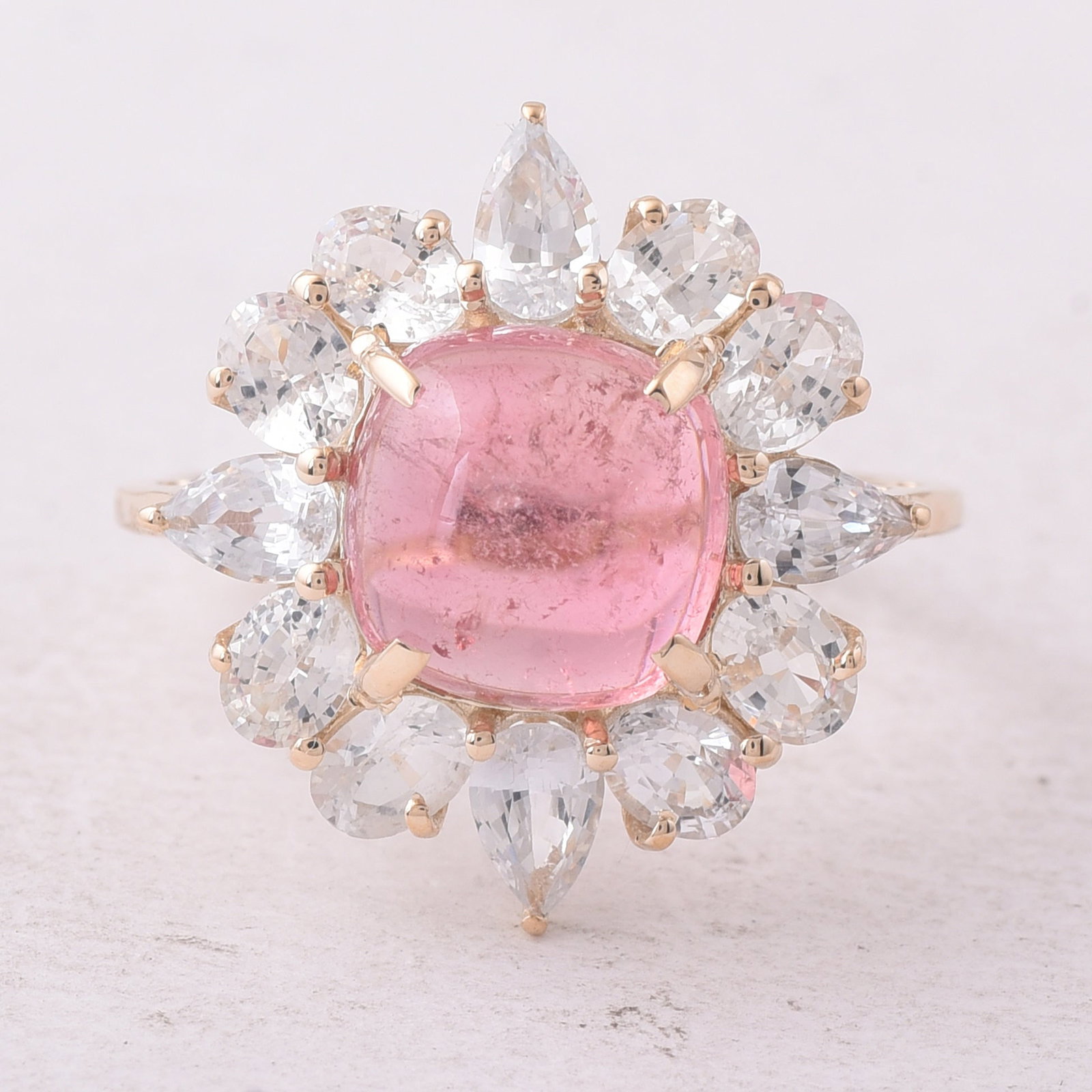 6.27 Ct Cushion Tourmaline 9K Gold Ring: 6.27 Total Carat Tourmaline 9K Gold Ring Specifications - Total Weight 3.207 g - Center Gemstone Tourmaline - Gemstone Carat Weight 3.53 Carats - Gemstone Measurements 9X9X5 mm - Additional Gemstones