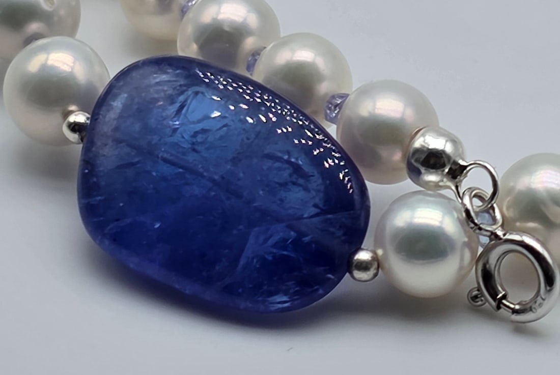 Akoya pearl necklace with a central tanzanite, gold spheres, tanzanite rondelles between each pearl, - 5