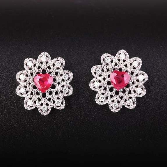 14K GOLD 0.76 CTW NATURAL RUBY & DIAMOND EARRINGS: Title:14K GOLD 0.76 CTW NATURAL RUBY & DIAMOND EARRINGS Description:Ref:230528701Gold Content:14K GoldMain Gemstone:RubyNumber of stones:2Shape:HeartCarat Weight:0.6ct Color:RedTreatment:NaturalCut Gr