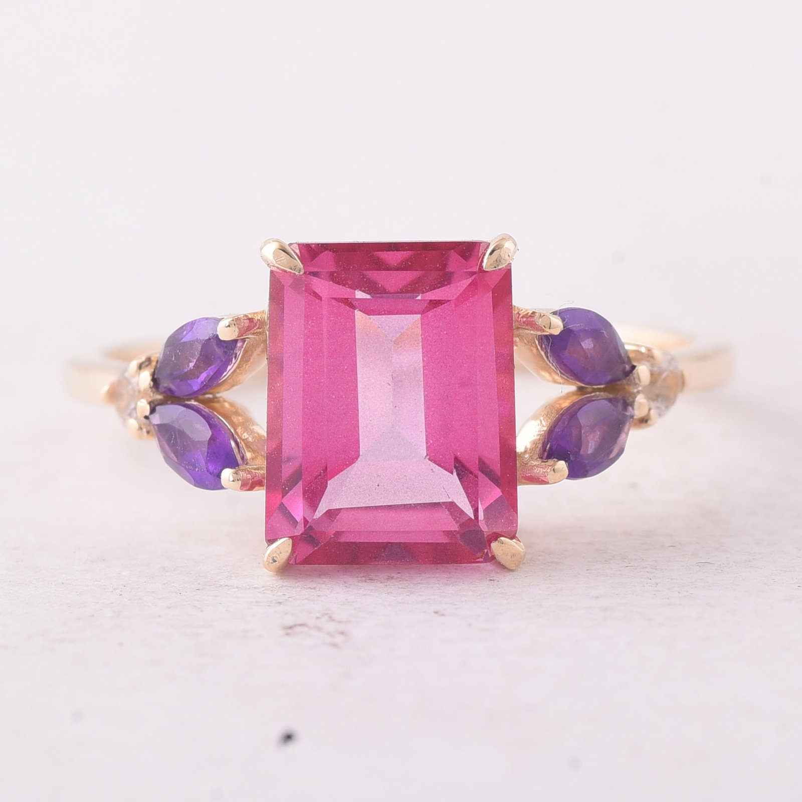 3.07 Ct Octagon Pink Topaz 9K Gold Ring: 3.07 Total Carat Pink Topaz 9K Gold Ring Specifications - Total Weight 2.241 g - Center Gemstone Pink Topaz - Gemstone Carat Weight 2.69 Carats - Gemstone Measurements 9X7X4.80 mm -