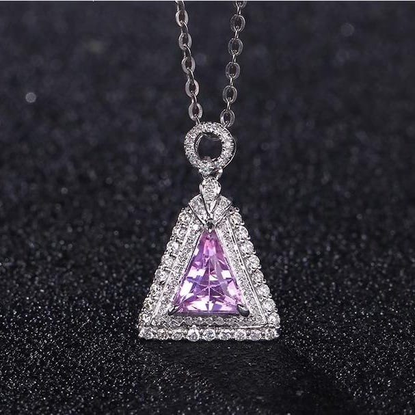 14K GOLD 1.05 CT NATURAL SAPPHIRE & DIAMOND PENDANT: Title:14K GOLD 1.05 CT NATURAL SAPPHIRE & DIAMOND PENDANTDescription:Ref:230528689Gold Content:14K GoldMain Gemstone:SapphireNumber of stones:1Shape:TriangleCarat Weight:1.05ct Color:Pinkish