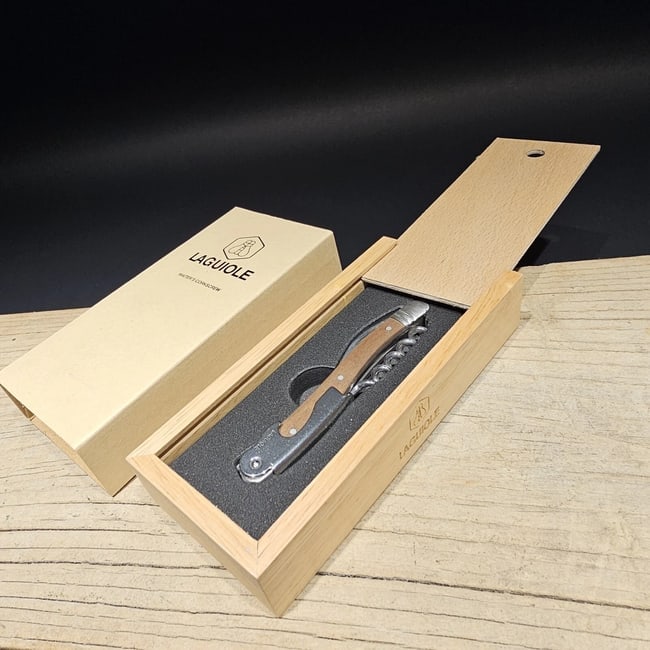 Corkscrew with Walnut Wood Handles: Title:Corkscrew with Walnut Wood HandlesDescription:4 1/2" long x 5/8" WideNice quality, brand new, never used heavy waiters style Laguiole corkscrew with walnut wood handles.This piece is made from s