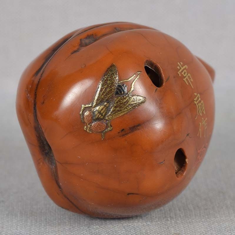 19c walnut netsuke lacquer SPIDER & FLIES by JOSEN illustrated: 19th century netsuke made out of walnut and decorated in lacquer with a spider and 2 flies on its surface. Excellent quality work (old loss to the head and leg of the spider), superb patina. Signed in
