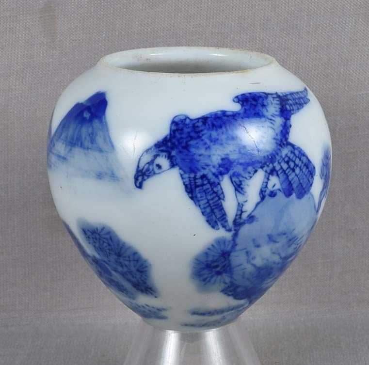 19c Chinese porcelain bird cage BIRD FEEDER / water cup EAGLE: 19th century Chinese porcelain bird feeder / water cup with conical bottom for hanging in a bird cage. Superb quality underglaze blue painting of an eagle perched on a rock and distant mountains in th