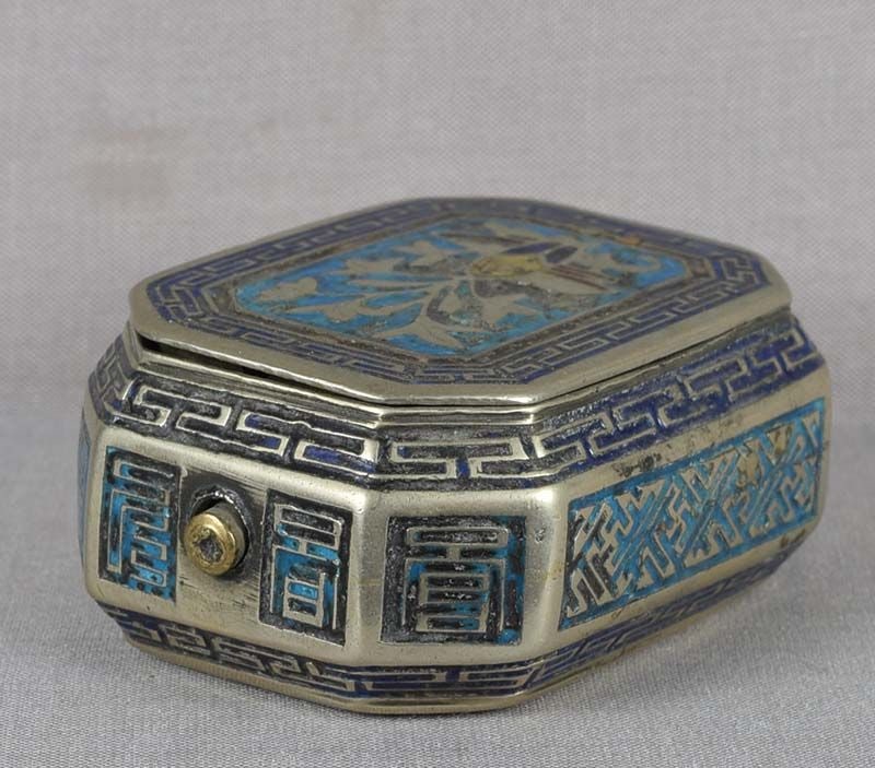 18/19c Chinese paktong champleve OPIUM BOX lotus: 18th - early 19th century Chinese paktong opium box with champleve decoration of plants (lotus?) on both sides and lattice patterns around its perimeter. Spring loaded button for opening the cover, wo