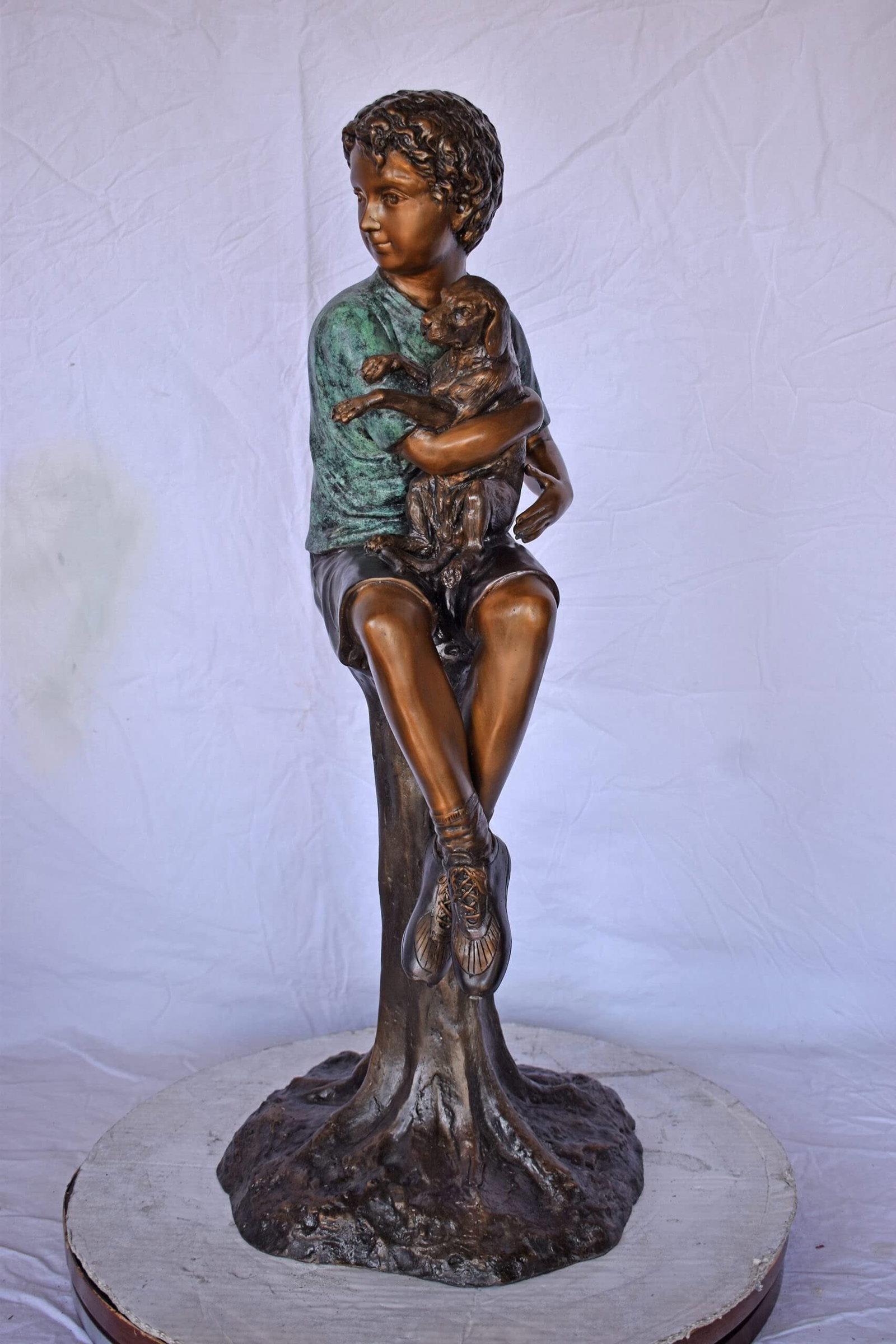 Boy Sitting on A Log with His Puppy Bronze Statue - Size: 15"L x 15"W x 35"H. - 2