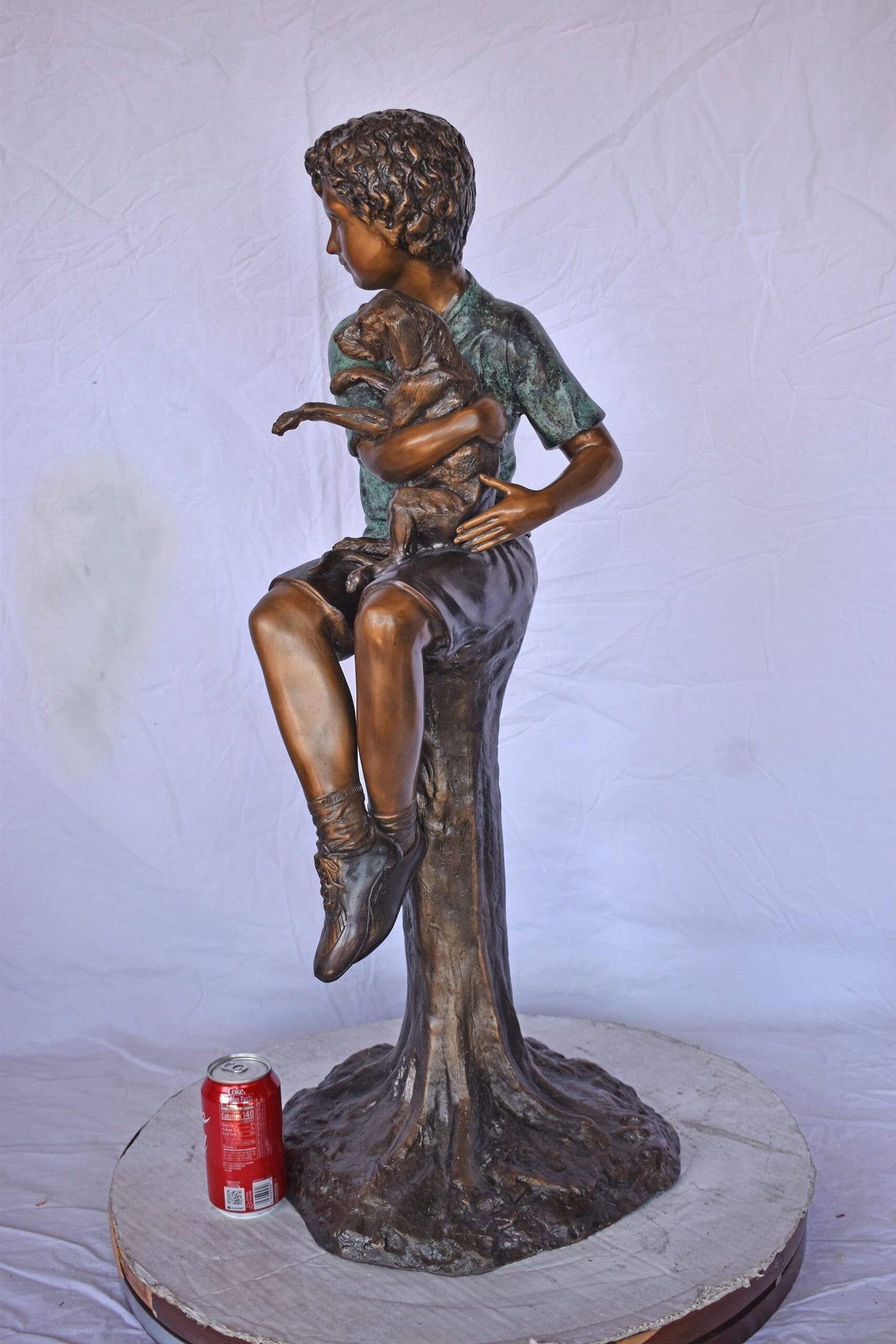 Boy Sitting on A Log with His Puppy Bronze Statue - Size: 15"L x 15"W x 35"H. - 3