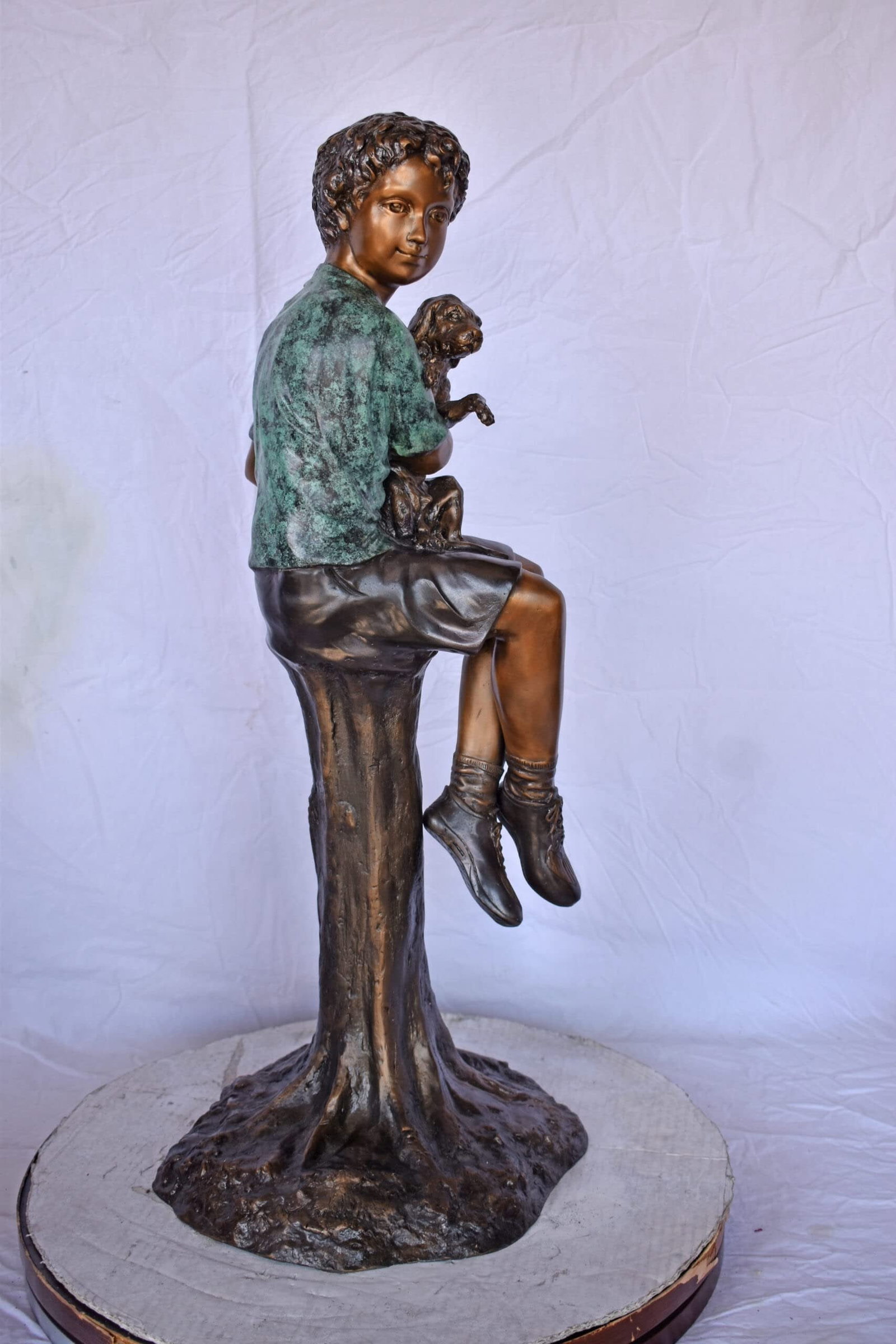 Boy Sitting on A Log with His Puppy Bronze Statue - Size: 15"L x 15"W x 35"H. - 8