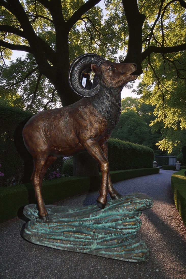 Life Size Ram standing on a rock Bronze Statue - Size: 38"L x 19"W x 45"H. - 3