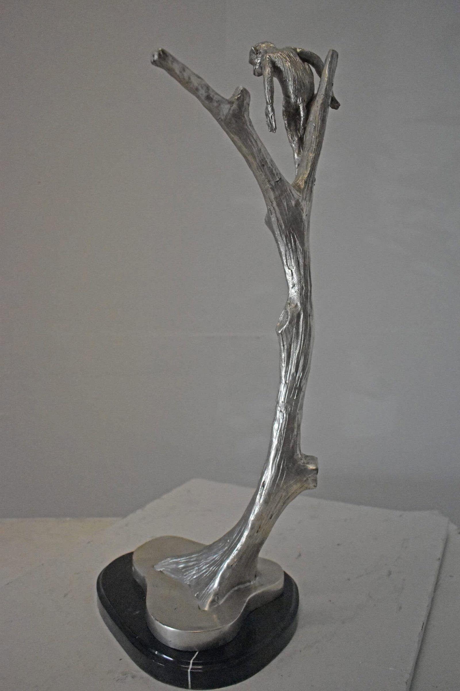 Monkey Resting on a Tree Silver Finish Bronze Statue - Size: 12" x 13" x 27"H. - 8