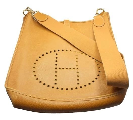 Authentic! Hermes Evelyne Natural Tan Clemence Leather GM Handbag Purse: Authentic! Hermes Evelyne Natural Tan Clemence Leather GM Handbag Purse About This Piece: Bag Hermes Evelyne Yellow Hardware Size: 13 inches x 12.75 inches x 3 inches Strap: 18" strap drop 