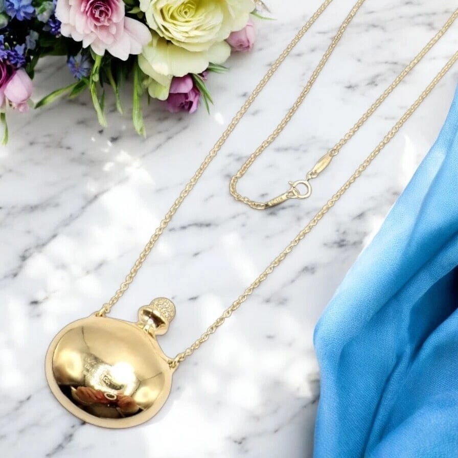 Rare! Tiffany & Co Peretti 18k Yellow Gold Diamond Extra Large Bottle Necklace: Rare! Tiffany & Co Peretti 18k Yellow Gold Diamond Extra Large Bottle Necklace Product Description About This Piece: Experience a piece of jewelry history with this exquisite vintage 1970s Tiffany & C