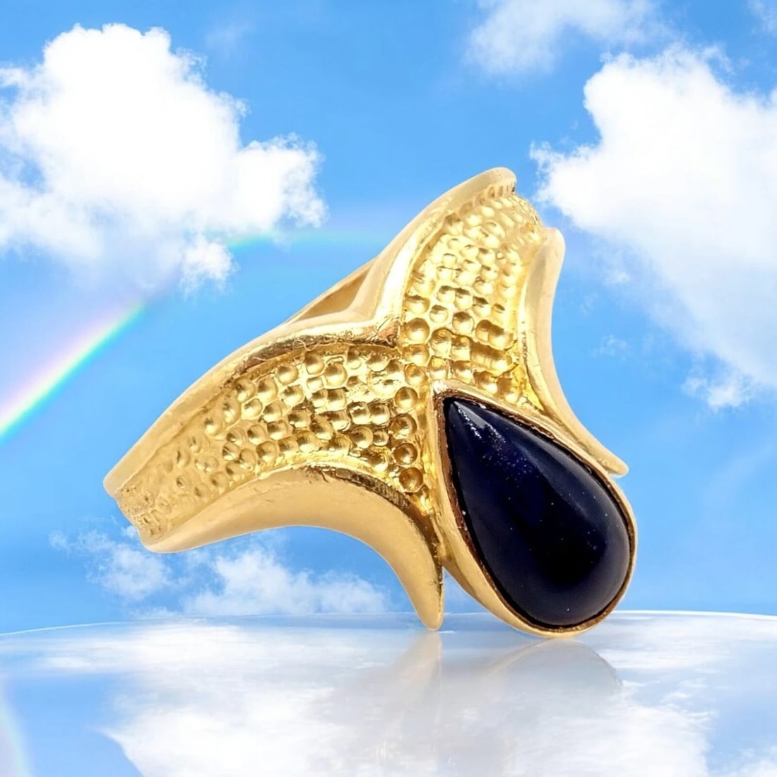 Authentic! Ilias Lalaounis Greece 18k Yellow Gold Onyx Ring: Striking Ilias Lalaounis ring handcrafted in Greece from 18k yellow gold, showcasing a bold pear-shaped black onyx center. The textured gold band and sculptural design reflect the brand’s signat