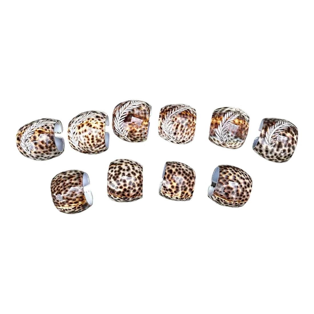 Set of 10 Tiger Cowrie Seashell Napkin Rings Engraved: Large set of 10 natural Cowrie Seashell napkin rings. 6 are engraved with leaf motif and 4 are not giving you a variety to enjoy. Beautiful organic addition to your coastal tablescape or a unique
