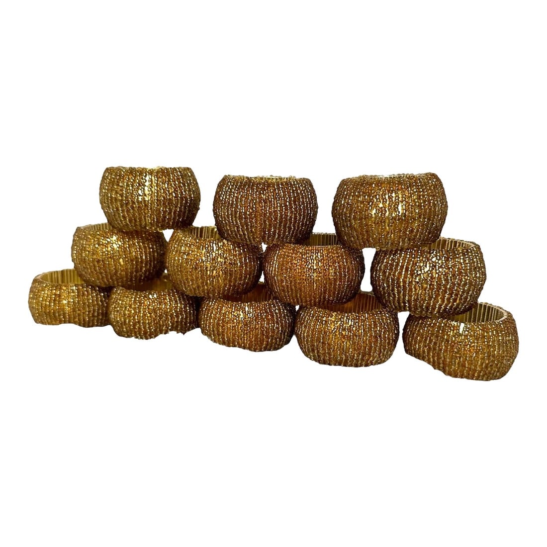 Late 20th Century Gold Beaded Napkin Rings- Set of 12: Large set of 12 gold beaded napkin rings. Add some bling for everyday or a touch of elegance on special occasions to your tablescape. Good pre-owned condition Condition: Alterations: Original Conditio