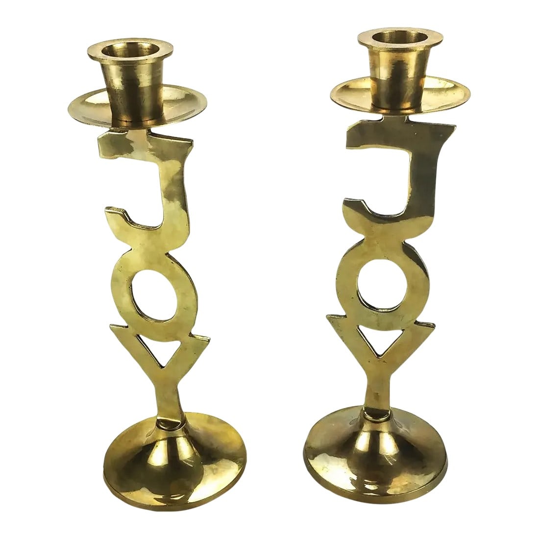 Solid Brass Pair of Joy Motif Candleholders MCM: Just in time for the festive season. Adorn your table with this vintage pair of solid brass candle holders. These have been well taken care of and are in wonderful condition with a slight patina showi