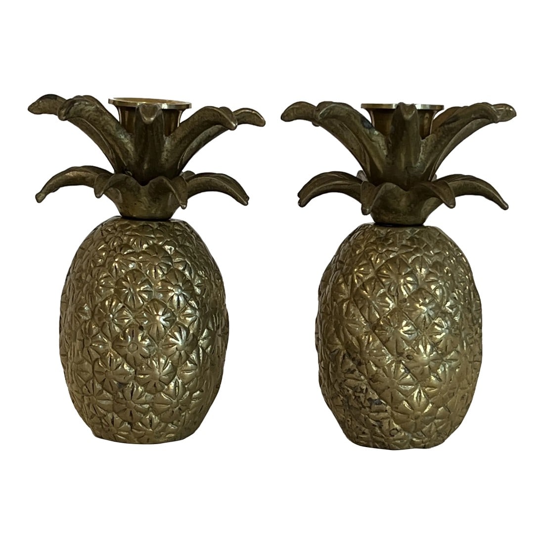 Vintage Pair Hollywood Regency Brass Pineapple Candlestick Holders With Floral Etching: Transform your space with this stunning pair of Hollywood Regency-style brass pineapple candlestick holders, a true testament to vintage elegance and sophistication. Perfect for adding a touch of glam