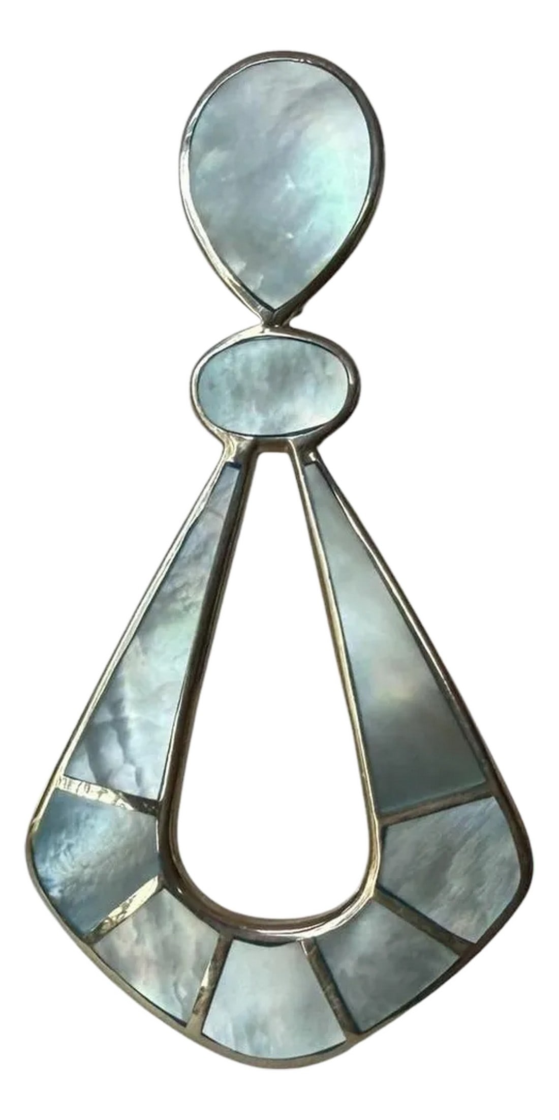 1980s Sterling Silver Mother of Pearl Pendant: Sterling Silver Marked 925 with inlaid Mother of Pearl Geometric shape with reticulated teardrop center. 2.75" long x 1.25" wide x 1/16" deep Excellent vintage condition with minor scratches on