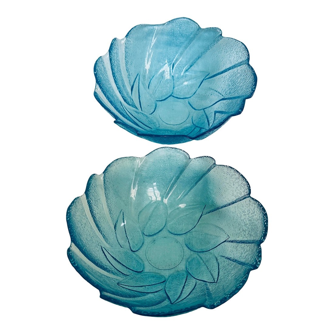 Pair of Sky Blue Textured Salad Bowls: Pair of Sky Blue Textured Salad Bowls with leaf pattern in center. Has a swirl design with a textured outer side. Perfect to mix and match with other sky blue glassware. Maker could be Hazel-Atlas 7in
